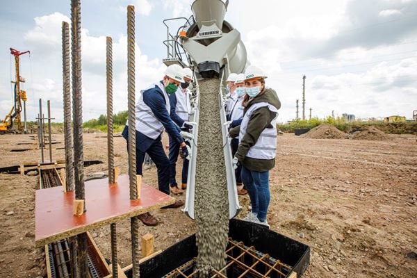 Ecoo Beringen legt fundamenten van nieuwe recyclagebedrijf op Biostoomsite